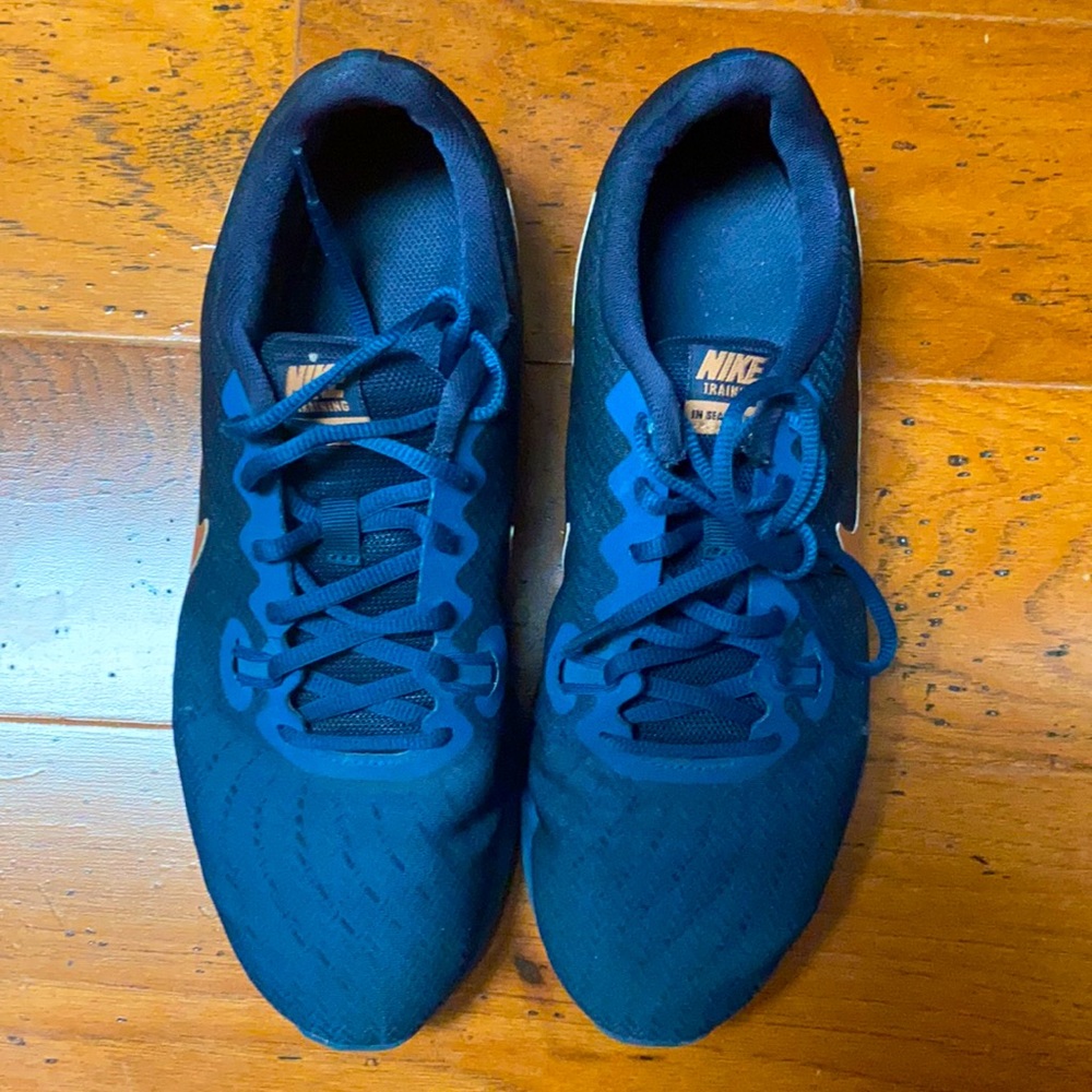 Blue Nikes rose gold check.